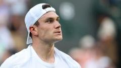 Draper through Wimbledon opener as opponent retires​​