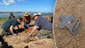 Rare Christian cross among spectacular 1,000-year-old Viking treasures found by metal detectorists​​