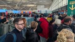 Long queues after power surge at Stansted Airport​​